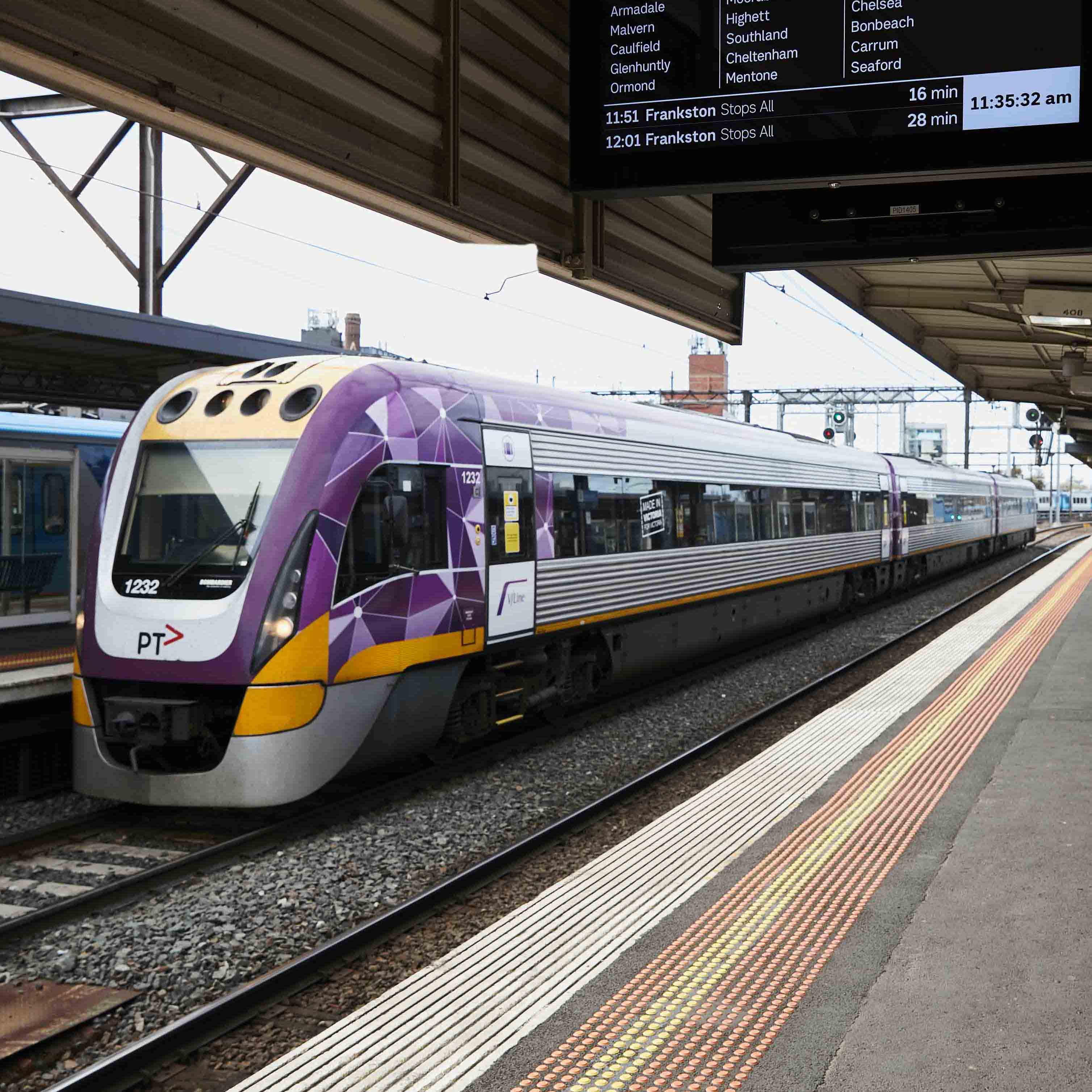 A V/Line train standing at a station platform.